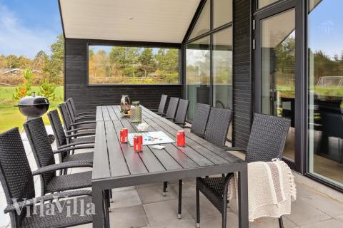 Das Luxusferienhaus Nr. 596 hat eine tolle Terrasse, die mit hochwertigen Gartenmöbeln für 20 Personen ausgestattet ist.