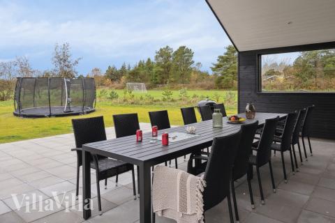 Genießen Sie einen Grillabend auf der Terrasse des Luxusferienhauses Nr. 596 in Südjütland