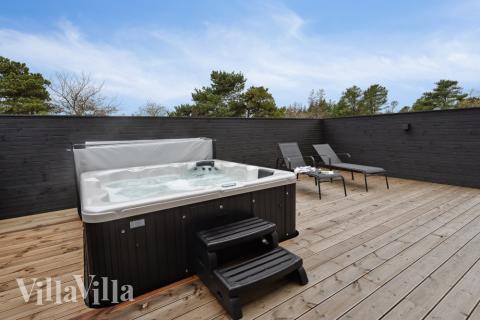 Das Luxusferienhaus Nr. 596 bietet u. a. einen tollen Whirlpool