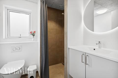 Eines der Badezimmer im Luxusferienhaus Nr. 597