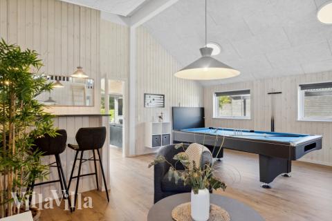 Neben den vielen schönen Stunden, die man im Poolbereich des Hauses verbringen kann, bietet das Luxusferienhaus 597 auch Spielevergnügen bei Billard/Tischtennis und Darts