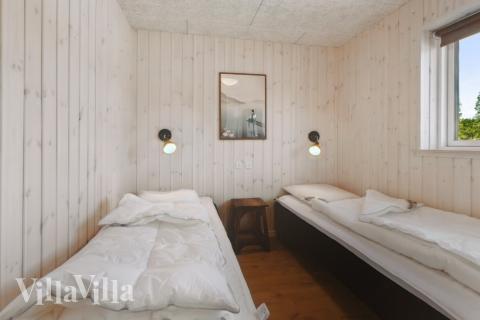 Eines der 8 Schlafzimmer im Luxusferienhaus Nr. 598