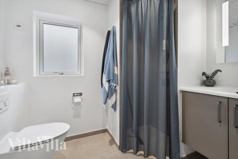 Eines der Badezimmer im Luxusferienhaus Nr. 599