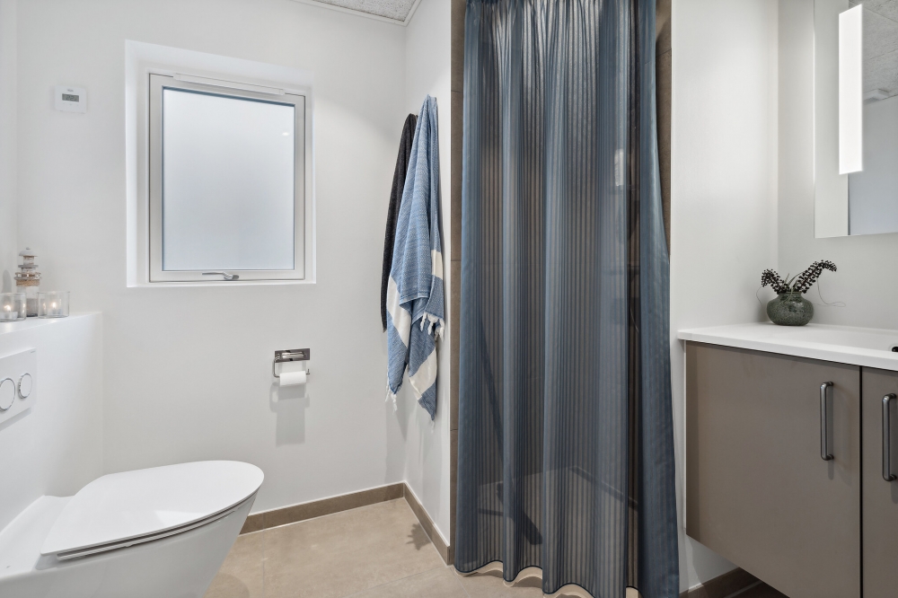 Eines der Badezimmer im Luxusferienhaus Nr. 599