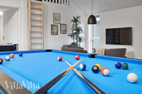 Neben den vielen schönen Stunden, die man im Poolbereich des Hauses verbringen kann, bietet das Luxusferienhaus 599 auch Spielevergnügen bei Billard/Tischtennis und Darts