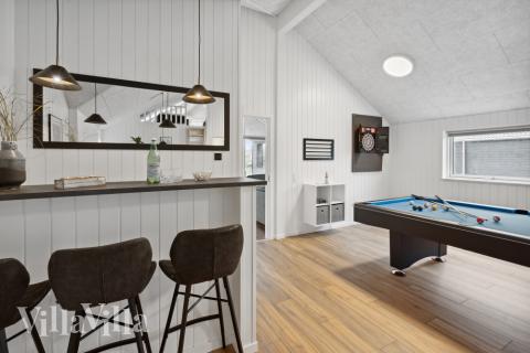 Aktivitätsraum im Luxusferienhaus Nr. 599 mit 6 Schlafzimmern und Platz für 16 Gäste.