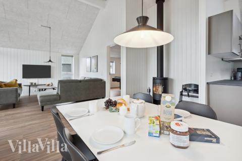 Aufenthaltsraum mit Platz für 16 im Luxusferienhaus Nr. 599.