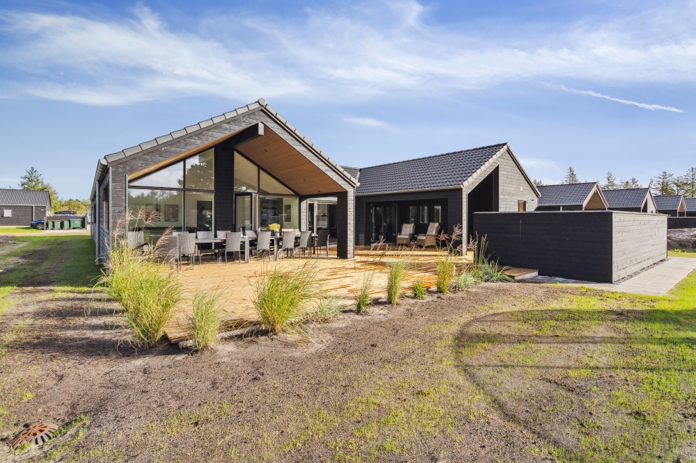 Das Luxusferienhaus Nr. 599 hat eine tolle Terrasse, die mit hochwertigen Gartenmöbeln für 16 Personen ausgestattet ist.