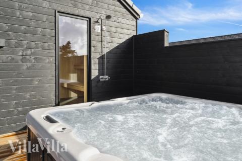 Das Luxusferienhaus Nr. 599 bietet u. a. einen tollen Whirlpool