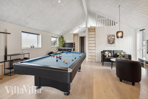 Aktivitätsraum im Luxusferienhaus Nr. 600 mit 7 Schlafzimmern und Platz für 18 Gäste.