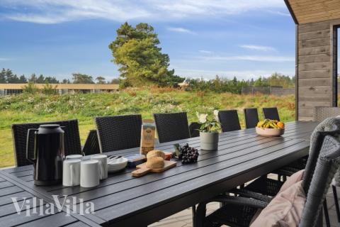 Genießen Sie einen Grillabend auf der Terrasse des Luxusferienhauses Nr. 600 in Südjütland