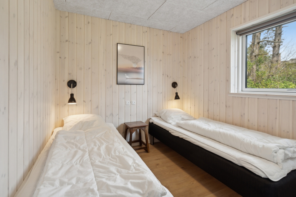 Eines der 6 Schlafzimmer im Luxusferienhaus Nr. 595