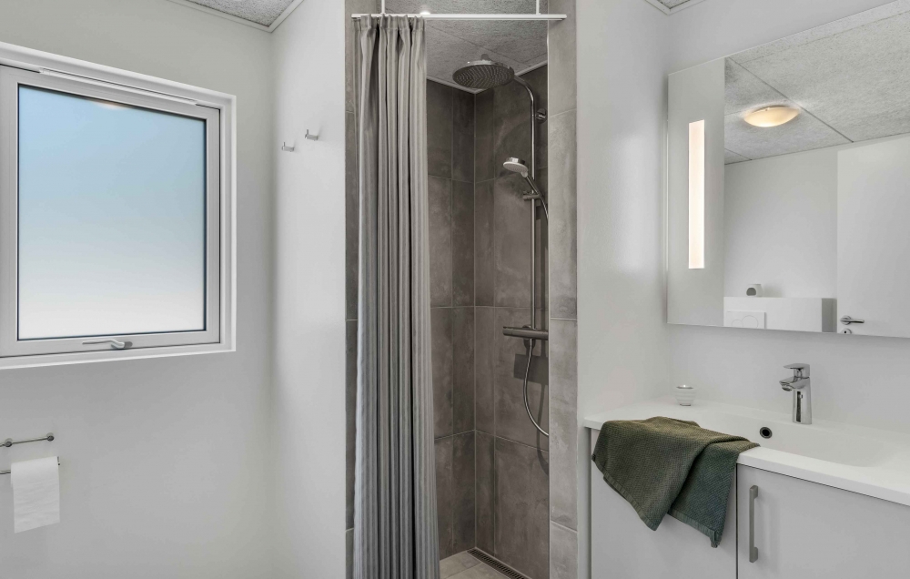 Eines der Badezimmer im Luxusferienhaus Nr. 582
