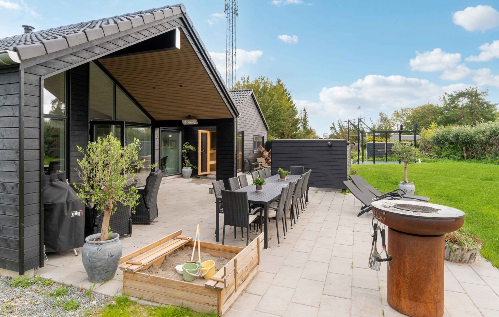 Das Luxusferienhaus Nr. 582 hat eine tolle Terrasse, die mit hochwertigen Gartenmöbeln für 14 Personen ausgestattet ist.