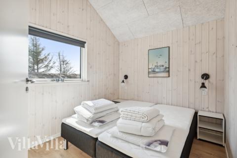 Eines der 9 Schlafzimmer im Luxusferienhaus Nr. 585