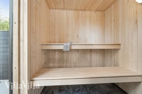 Genießen Sie die heiße Sauna im Luxusferienhaus Nr. 585 für 24 Personen