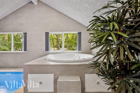 Genießen Sie den warmen Whirlpool im Luxusferienhaus Nr. 750 in Deutschland