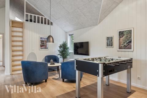 Das Luxusferienhaus 750 für 18 Personen hat einen großen Aktivitätsraum mit u. a. Billard und Darts