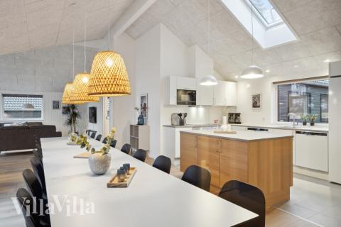 Aufenthaltsraum mit Platz für 18 im Luxusferienhaus Nr. 752.