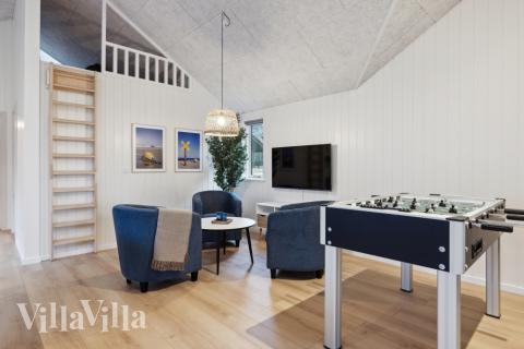 Das Luxusferienhaus 752 für 18 Personen hat einen großen Aktivitätsraum mit u. a. Billard und Darts