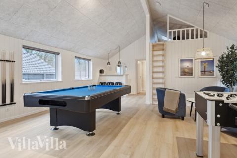 Neben den vielen schönen Stunden, die man im Poolbereich des Hauses verbringen kann, bietet das Luxusferienhaus 752 auch Spielevergnügen bei Billard/Tischtennis und Darts
