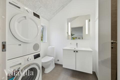 Eines der Badezimmer im Luxusferienhaus Nr. 754