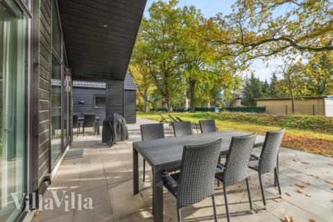 Genießen Sie einen Grillabend auf der Terrasse des Luxusferienhauses Nr. 754 in Deutschland
