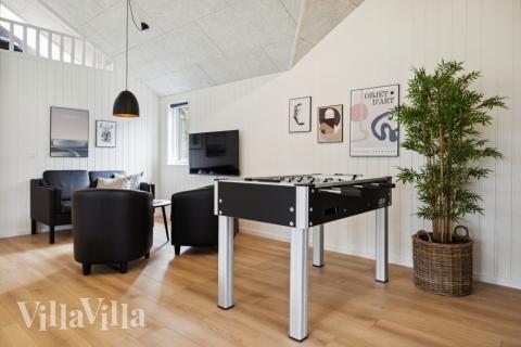 Das Luxusferienhaus 755 für 16 Personen hat einen großen Aktivitätsraum mit u. a. Billard und Darts