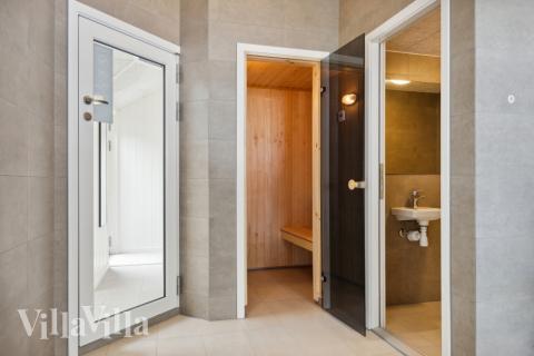 Genießen Sie die heiße Sauna im Luxusferienhaus Nr. 755 für 16 Personen