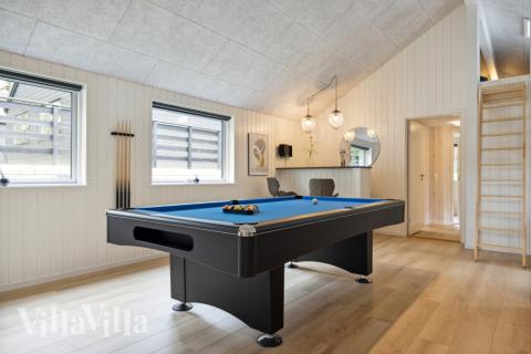 Neben den vielen schönen Stunden, die man im Poolbereich des Hauses verbringen kann, bietet das Luxusferienhaus 756 auch Spielevergnügen bei Billard/Tischtennis und Darts