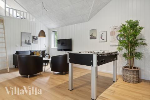 Das Luxusferienhaus 757 für 16 Personen hat einen großen Aktivitätsraum mit u. a. Billard und Darts