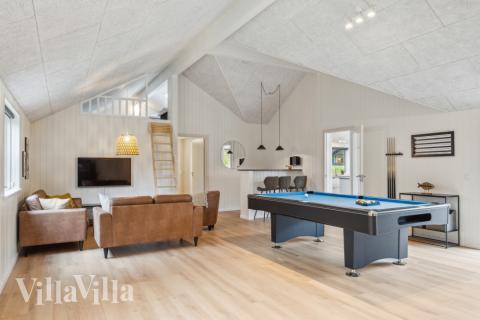 Neben den vielen schönen Stunden, die man im Poolbereich des Hauses verbringen kann, bietet das Luxusferienhaus 758 auch Spielevergnügen bei Billard/Tischtennis und Darts