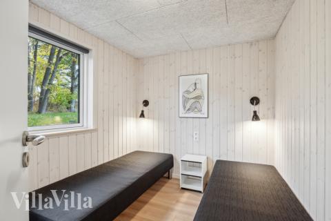 Eines der 9 Schlafzimmer im Luxusferienhaus Nr. 758