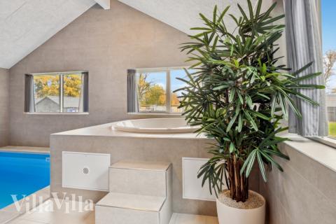 Genießen Sie den warmen Whirlpool im Luxusferienhaus Nr. 758 in Deutschland