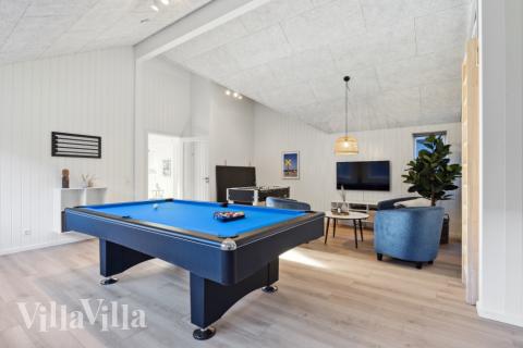 Neben den vielen schönen Stunden, die man im Poolbereich des Hauses verbringen kann, bietet das Luxusferienhaus 759 auch Spielevergnügen bei Billard/Tischtennis und Darts