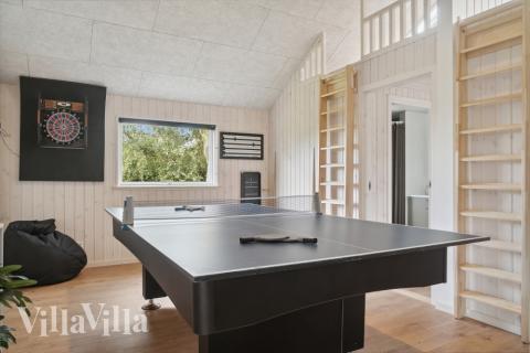 Aktivitätsraum im Luxusferienhaus Nr. 588 mit 5 Schlafzimmern und Platz für 14 Gäste.