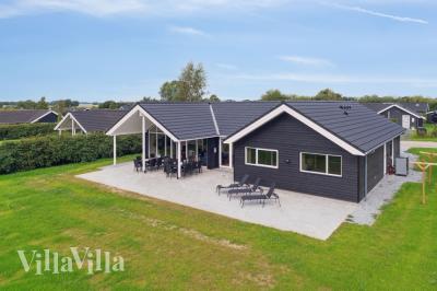 Dieses schöne Poolhaus Nr. 588 mit Platz für 14 Personen liegt in Lolland/Falster/Mön