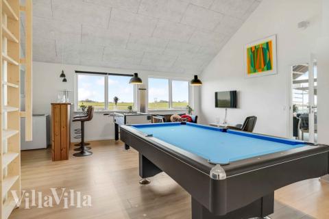 Neben den vielen schönen Stunden, die man im Poolbereich des Hauses verbringen kann, bietet das Luxusferienhaus 548 auch Spielevergnügen bei Billard/Tischtennis und Darts