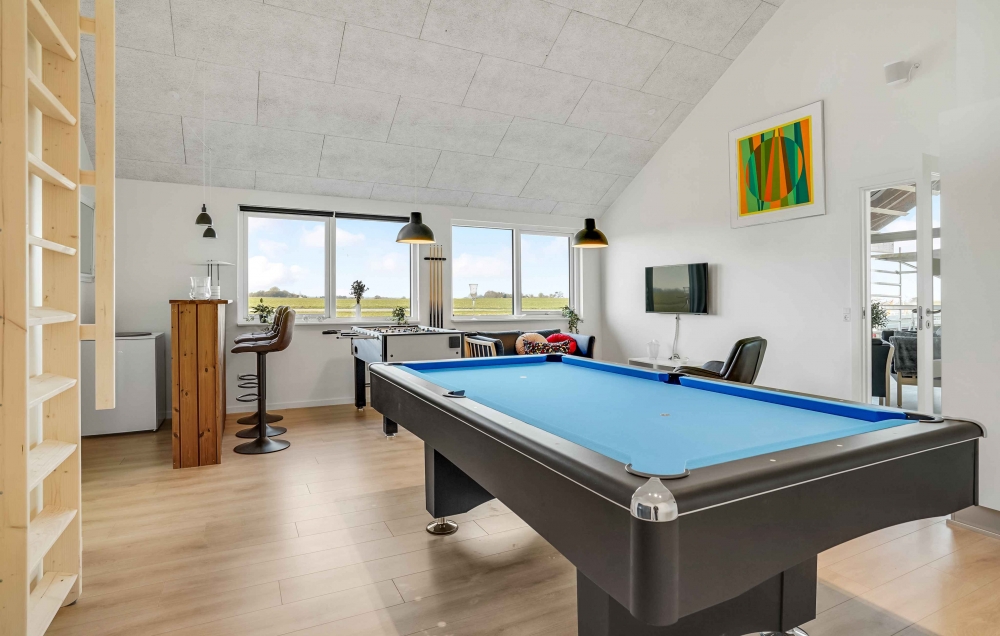 Neben den vielen schönen Stunden, die man im Poolbereich des Hauses verbringen kann, bietet das Luxusferienhaus 548 auch Spielevergnügen bei Billard/Tischtennis und Darts
