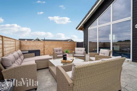 Das Luxusferienhaus Nr. 548 hat eine tolle Terrasse, die mit hochwertigen Gartenmöbeln für 20 Personen ausgestattet ist.