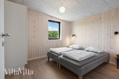 Eines der 7 Schlafzimmer im Luxusferienhaus Nr. 604