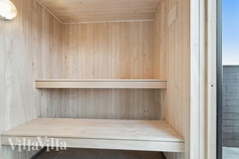 Genießen Sie die heiße Sauna im Luxusferienhaus Nr. 608 für 26 Personen