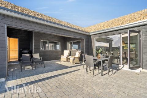 Auf der Terrasse des Ferienhauses Nr. 609 ist Platz für 18 Personen.