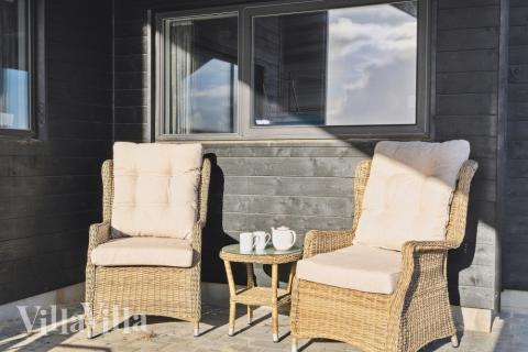 Genießen Sie einen Grillabend auf der Terrasse des Luxusferienhauses Nr. 609 in Westjütland