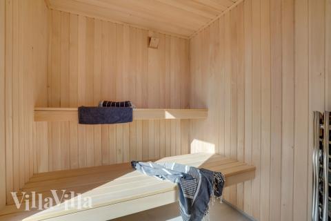 Genießen Sie die heiße Sauna im Luxusferienhaus Nr. 609 für 18 Personen