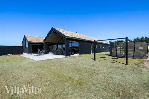 Dieses schöne Poolhaus Nr. 609 mit Platz für 18 Personen liegt in Westjütland