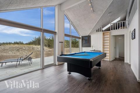 Aktivitätsraum im Luxusferienhaus Nr. 610 mit 7 Schlafzimmern und Platz für 18 Gäste.