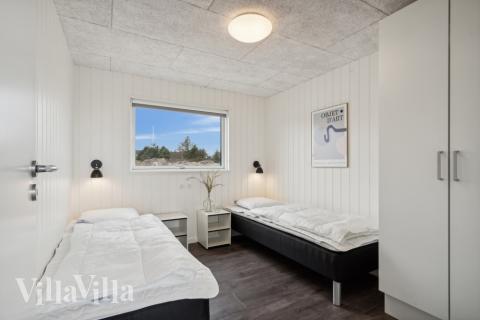 Eines der 7 Schlafzimmer im Luxusferienhaus Nr. 610