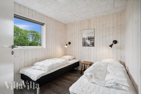 Eines der 8 Schlafzimmer im Luxusferienhaus Nr. 611
