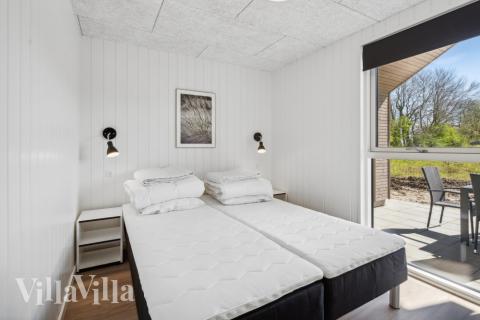 Eines der 9 Schlafzimmer im Luxusferienhaus Nr. 612